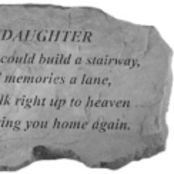 Stone plaque with a memorial quote engraved on it