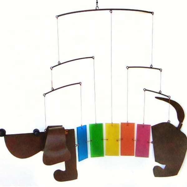 Colorful hanging mobile with dog shapes and rectangular panels