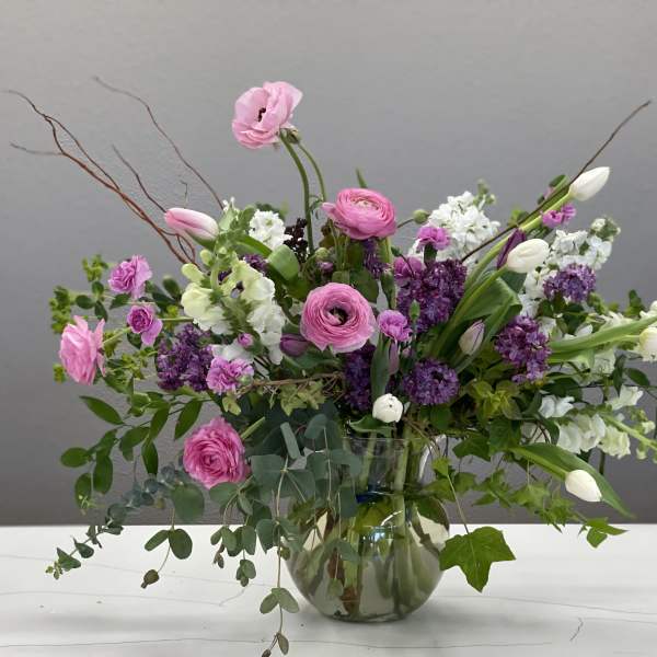 Pink and white mixed bouquet in a glass vase