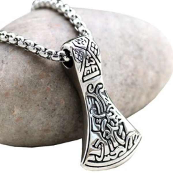 Silver pendant necklace with an engraved axe-shaped charm on a chain