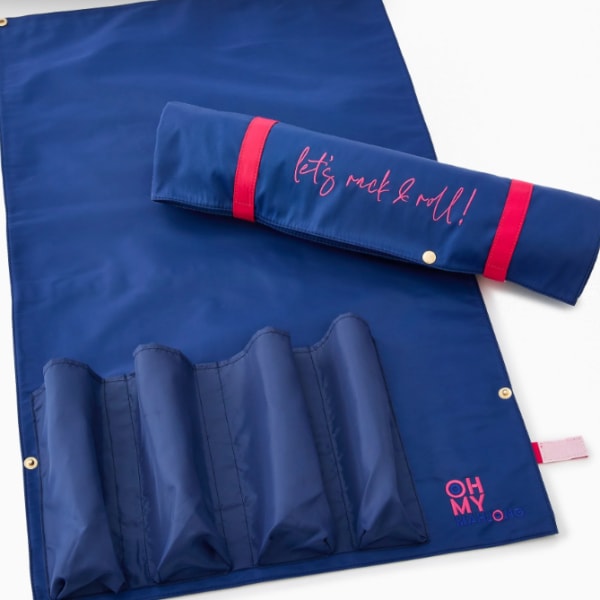 Blue fabric roll-up organizer with pink lettering and trim