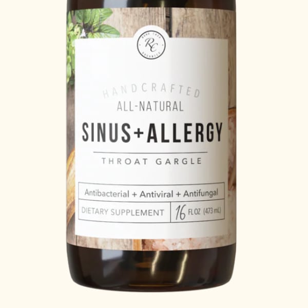 Amber bottle of sinus and allergy throat gargle supplement