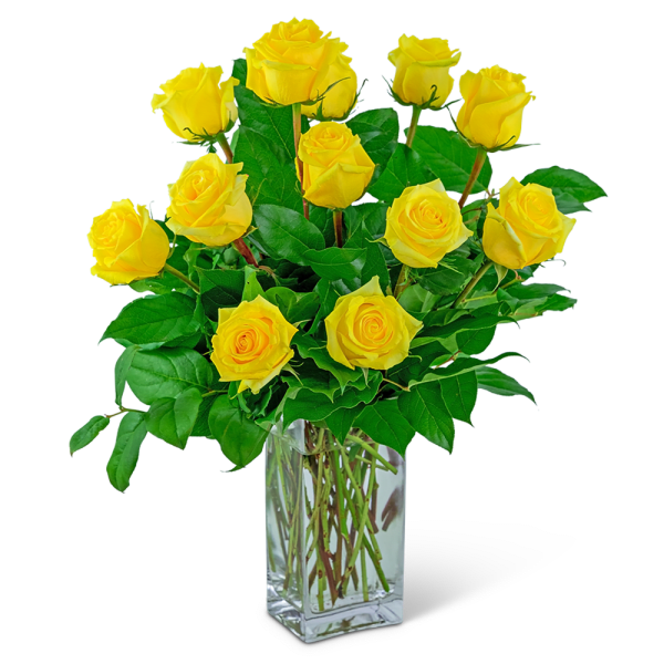 Yellow roses arranged in a clear glass vase