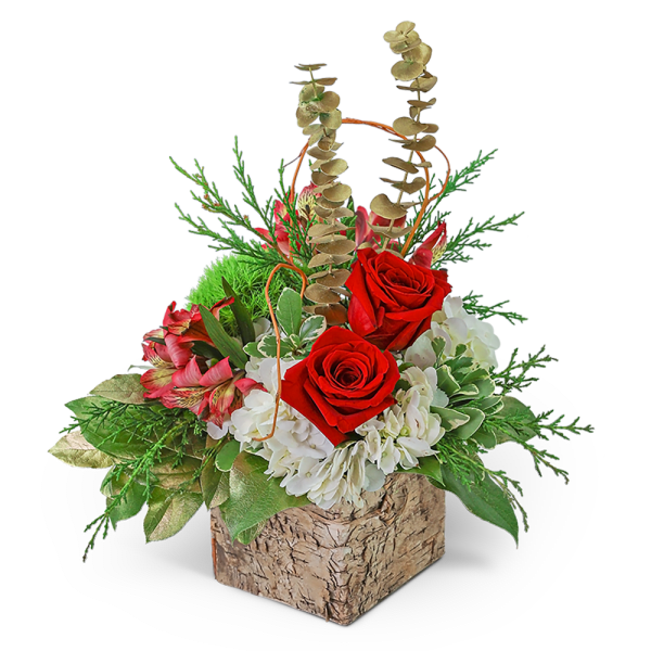 Red roses and white flowers in a bark-textured square container