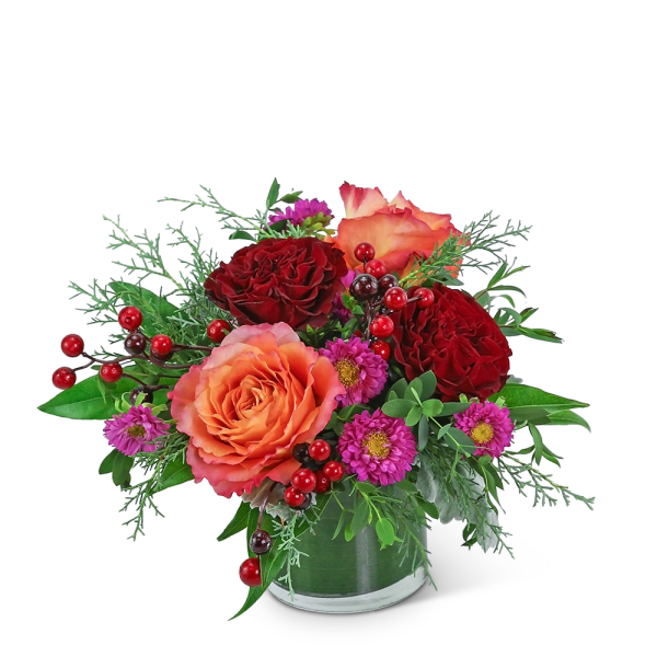 Arrangement of red and peach roses with purple daisies in a vase