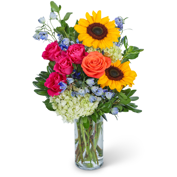 Bouquet of sunflowers, roses, and blue flowers in a glass vase