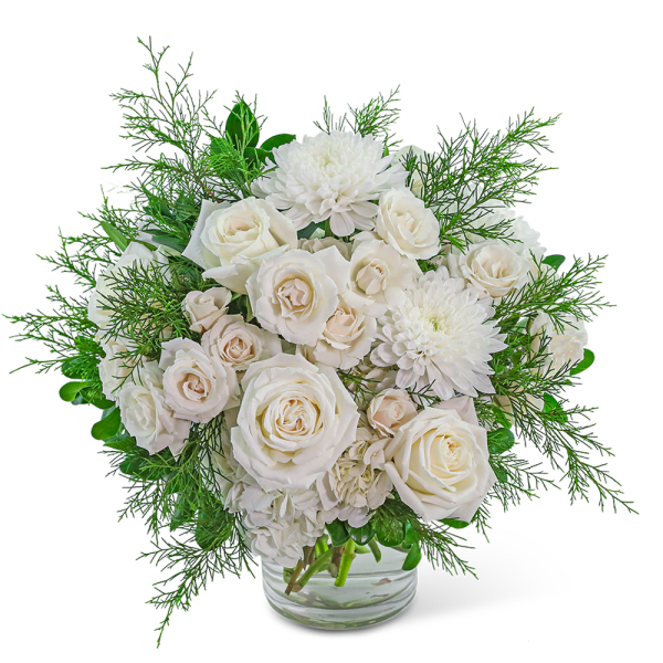 White roses and chrysanthemums in a clear glass vase