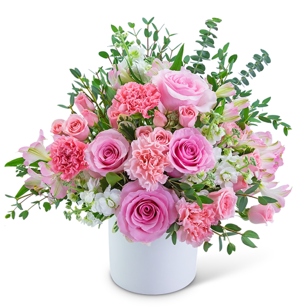 Pink roses and carnations in a white vase