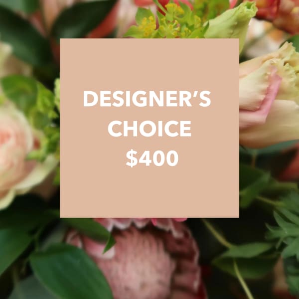Designer’s choice floral arrangement with pink and green blooms