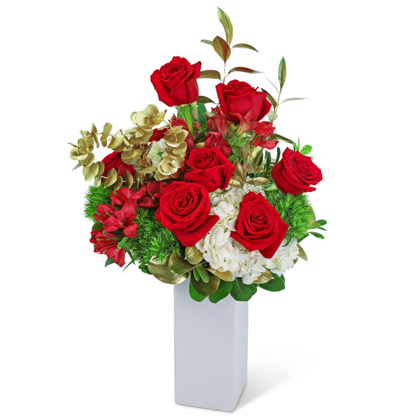 Red roses and white flowers arranged in a tall white vase