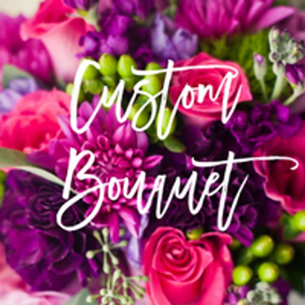 Pink and purple floral bouquet with roses and mixed blooms