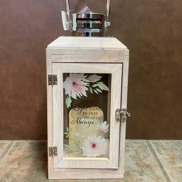 Wooden memorial lantern with floral panel and metal handle