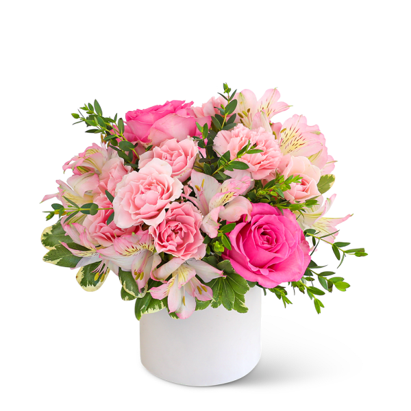 Pink roses and alstroemeria in a white vase