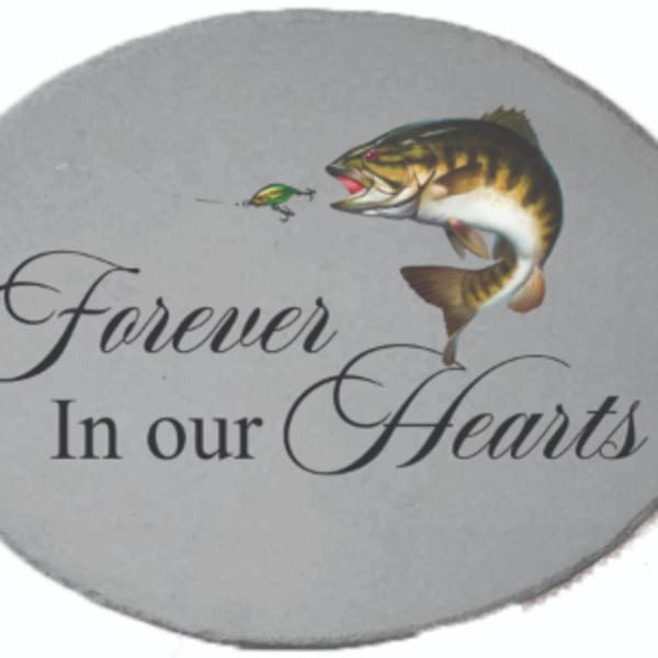 Gray memorial plaque with a fish and the words Forever In our Hearts