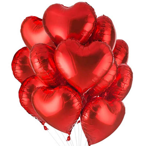 Cluster of red heart-shaped balloons on white background