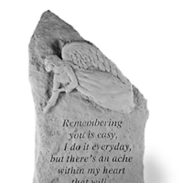 Angel memorial stone with an engraved sympathy message