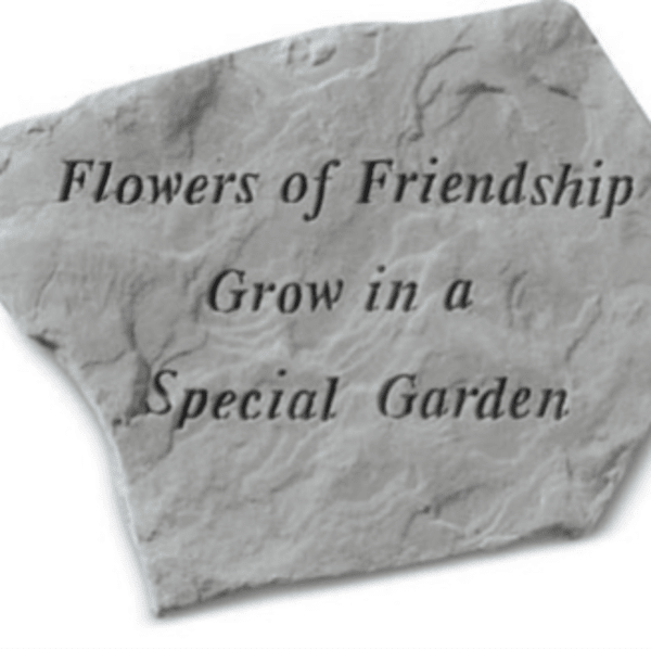 Stone plaque with the words "Flowers of Friendship" and "Grow in a Special Garden"