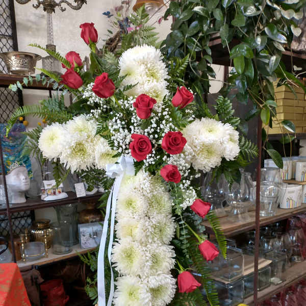 Standing floral cross with white chrysanthemums and red roses