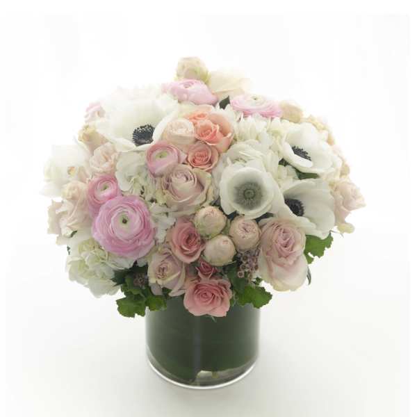 Pink and white bouquet in a glass vase
