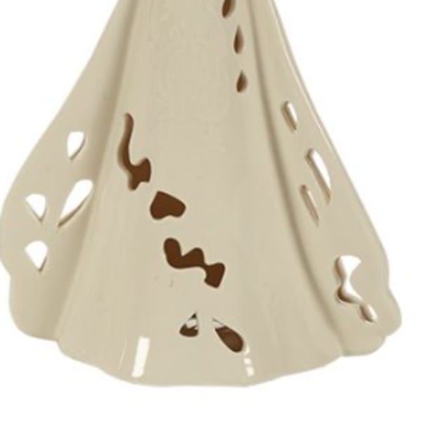 Ceramic angel figurine in a cream finish