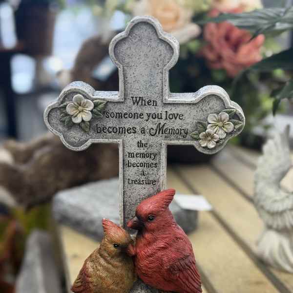 Decorative memorial cross with two birds and floral accents