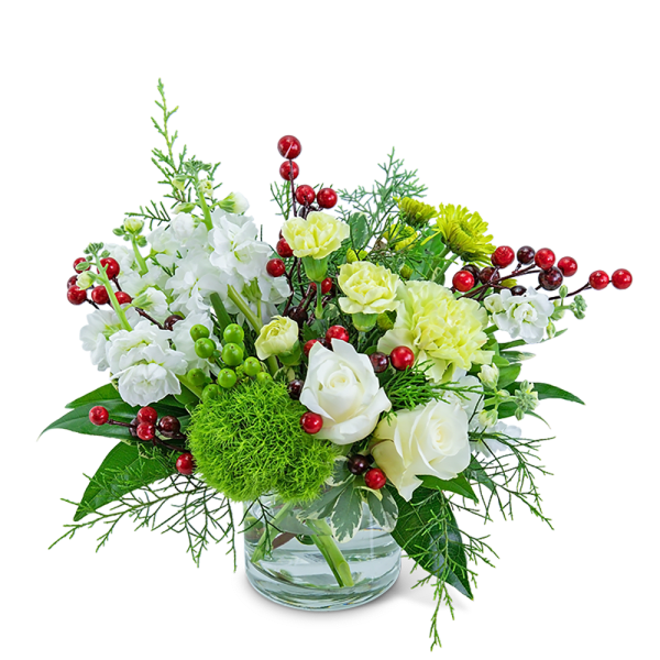 White and pale yellow floral arrangement in a clear glass vase
