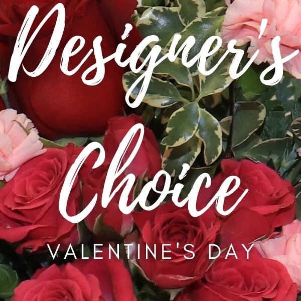 Red and pink roses with variegated greenery and Valentine's Day text