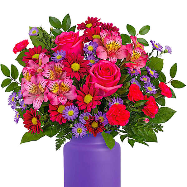 Mixed pink and purple flowers in a purple vase
