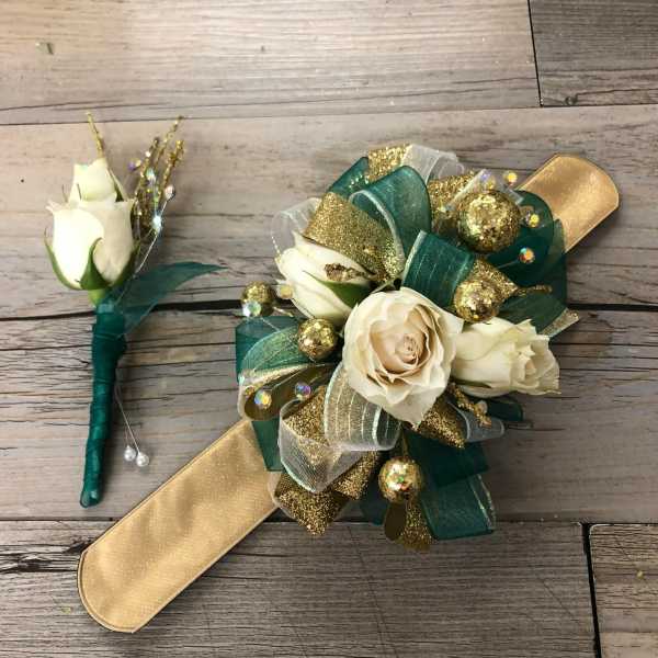 White rose boutonniere and matching wrist corsage with gold and green ribbon