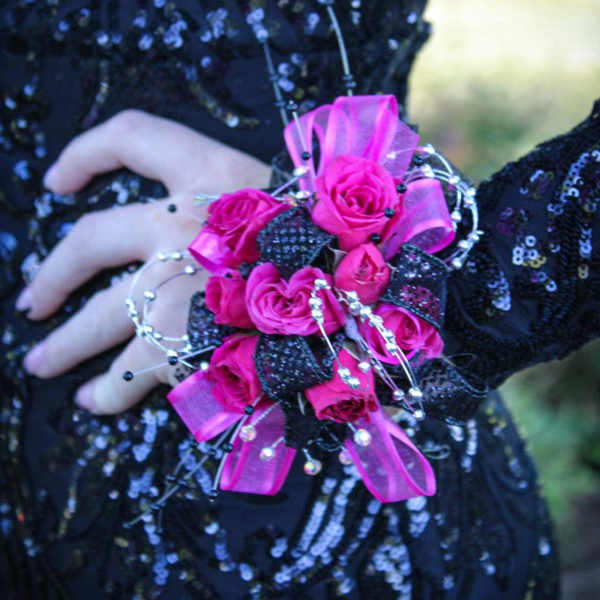 Pink rose wrist corsage with ribbon and rhinestone accents