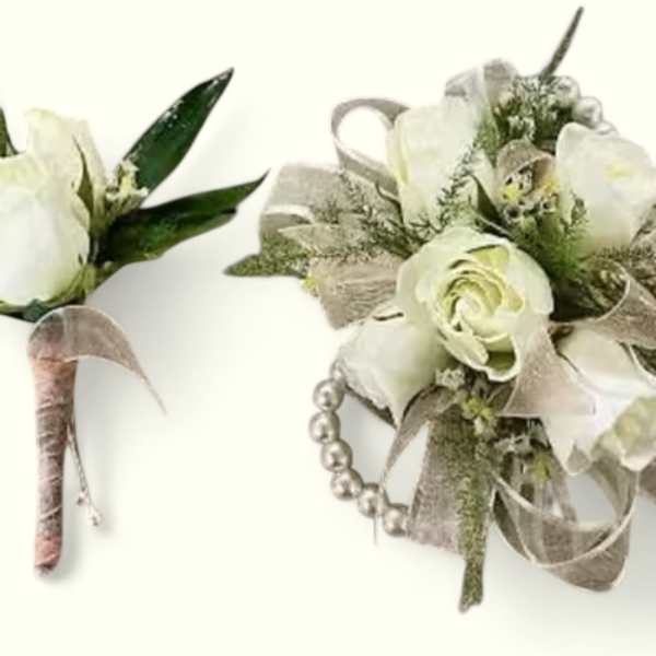White rose boutonniere with ribbon and pearl accents