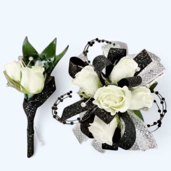 White rose boutonniere and matching wrist corsage with black and silver ribbon