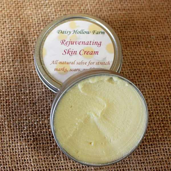 Two tins of skin cream on burlap fabric