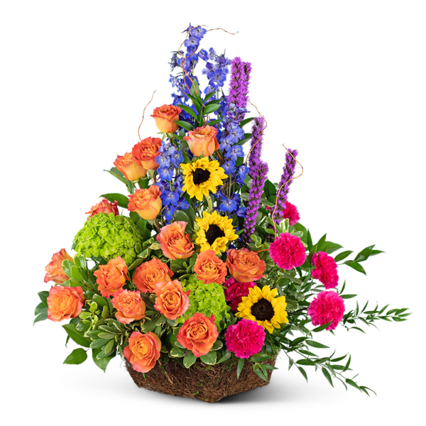 Mixed bouquet with orange roses, sunflowers, blue delphinium, and pink carnations in a basket