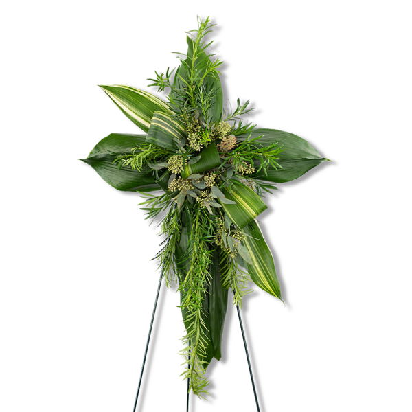 Green floral standing cross on an easel