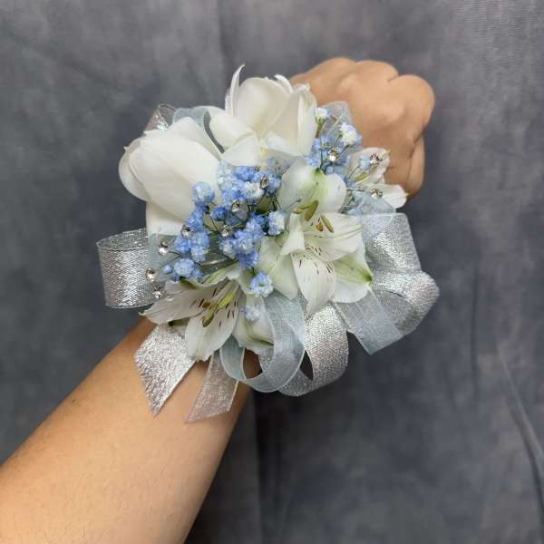 White tulips alstroemeria silver blue corsage