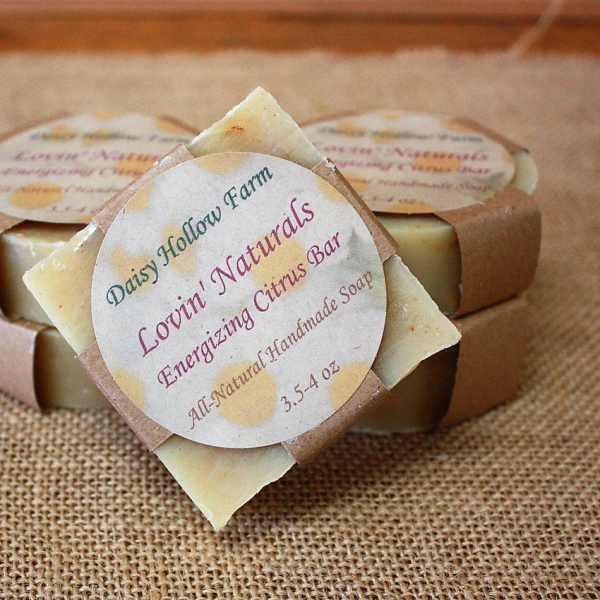 Stacked handmade soap bars with citrus labels