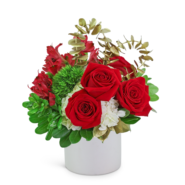 Red roses and white flowers in a white vase with gold foliage