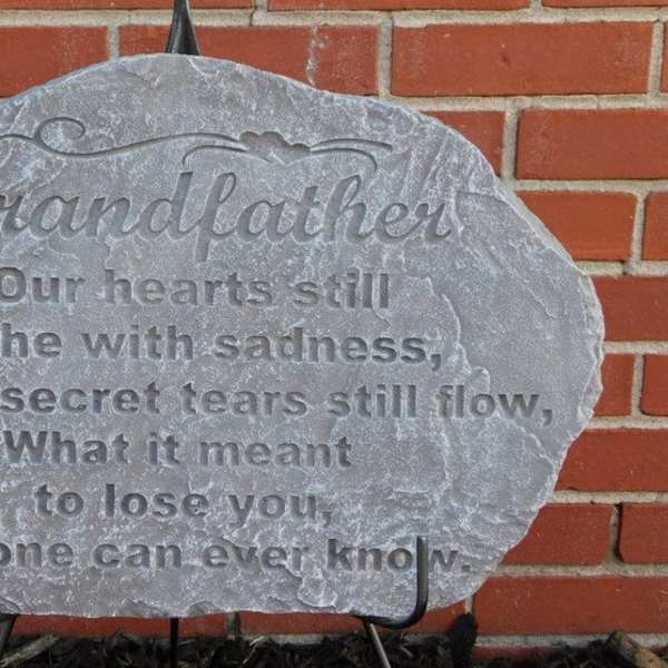 Engraved memorial stone with the word Grandfather and a poem