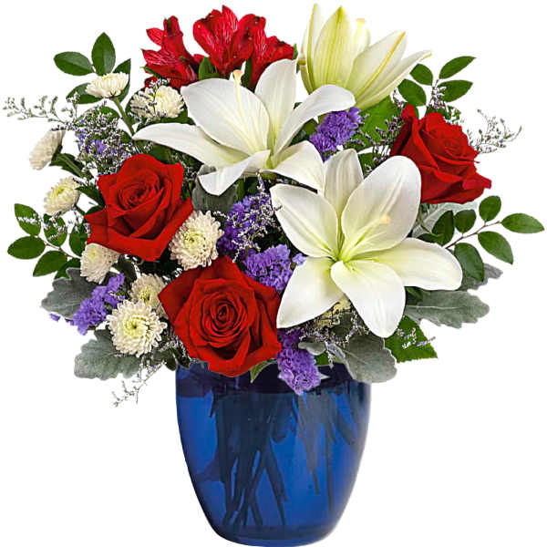 Red roses and white lilies in a blue glass vase