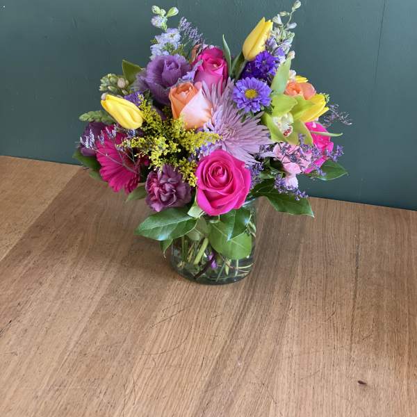 Colorful mixed bouquet in a glass vase