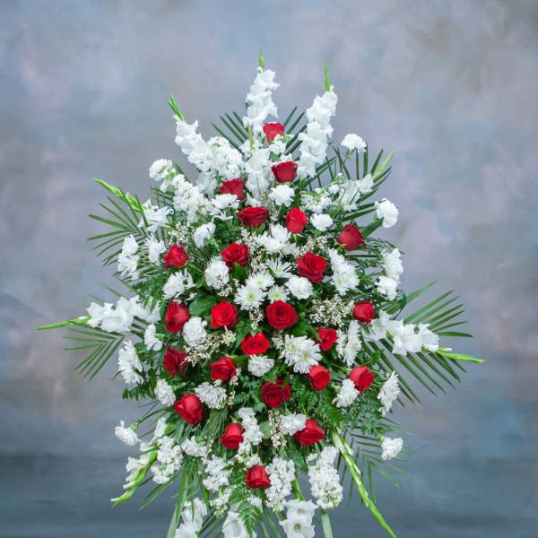 Standing floral spray with red roses and white flowers