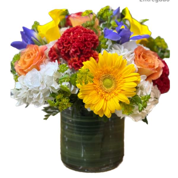 Mixed bouquet in a dark glass vase with yellow, orange, red, white, and purple flowers