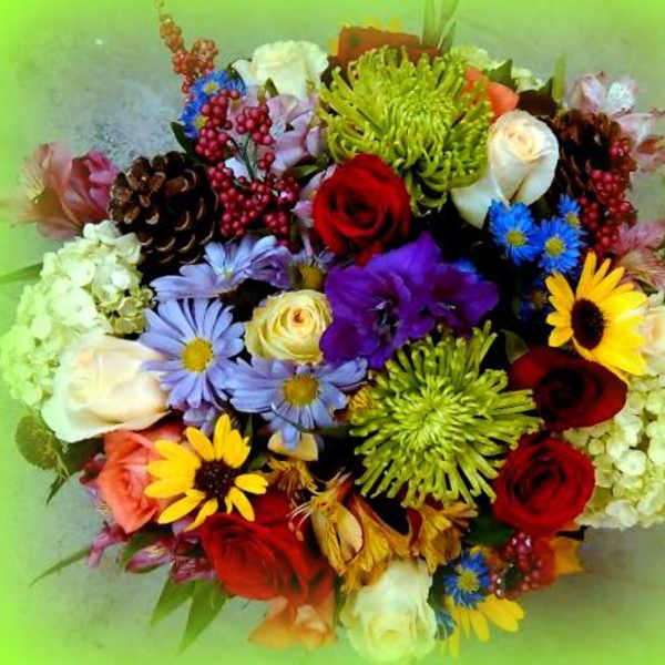 Mixed bouquet with roses, daisies, and chrysanthemums