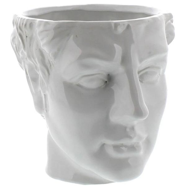 White ceramic planter shaped like a human face