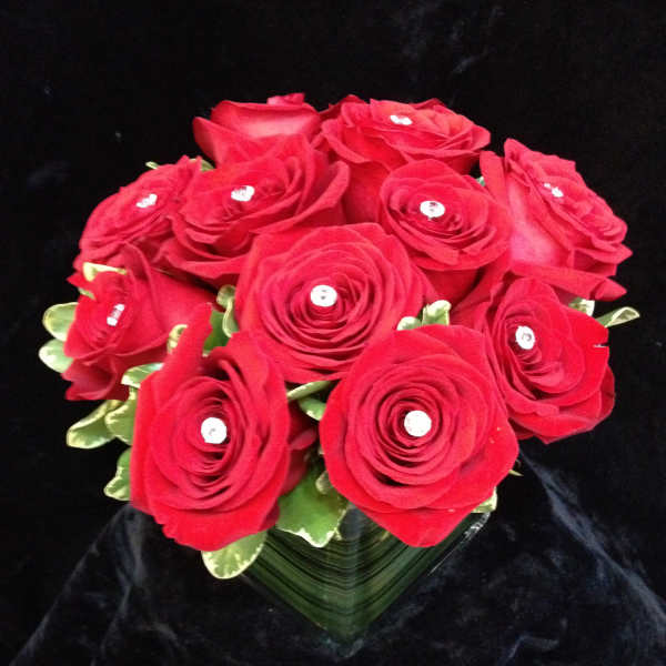 Bouquet of red roses with rhinestone centers