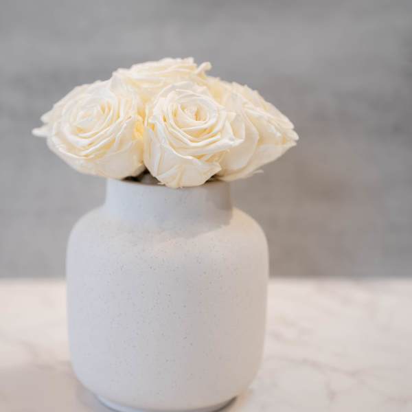 Cream Roses in Speckled Vase