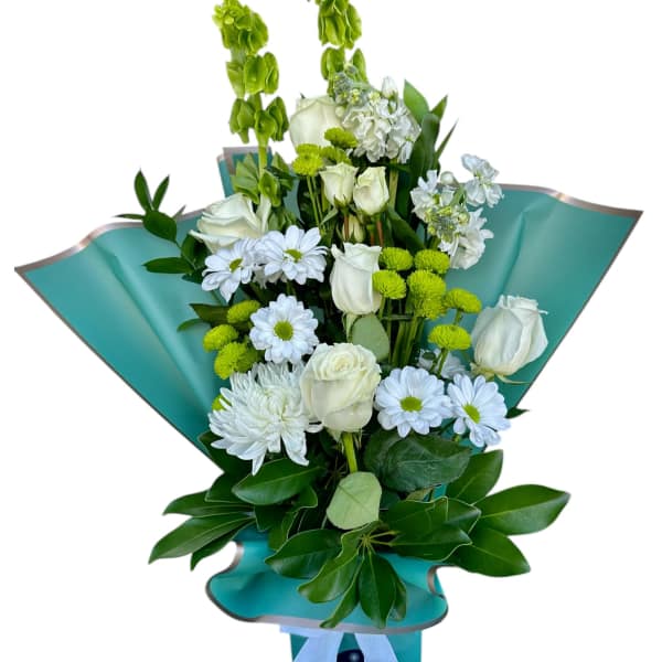 Bouquet of white roses and daisies with green accents in teal wrap