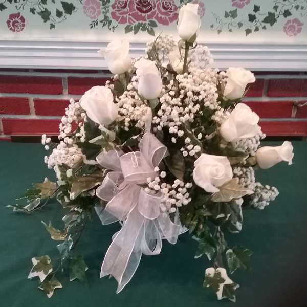 White rose bouquet with baby's breath and a sheer ribbon