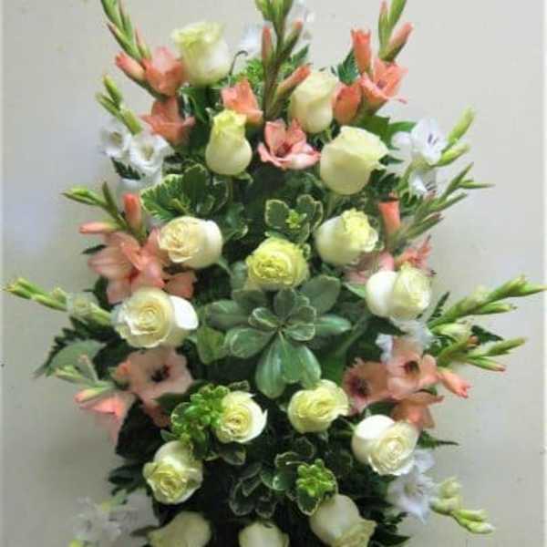 Tall floral spray with white roses and peach lilies